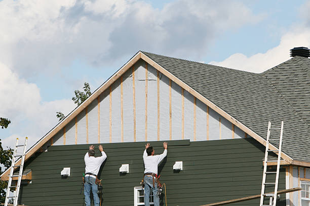Professional Siding technician working in Newport, MN